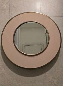 Deep round mirror detail and dusty pink