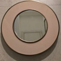 Deep round mirror detail and dusty pink