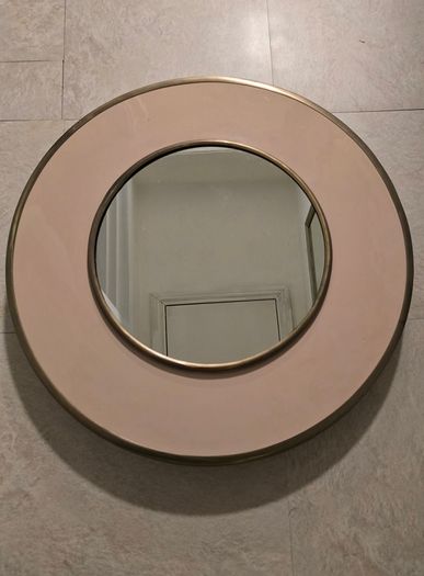 Deep round mirror detail and dusty pink