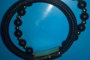 Mens Bracelet black and gold brand new