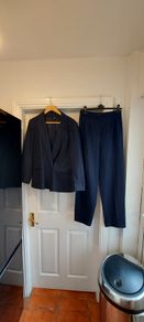 Navy pinstripe suit.