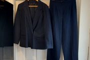 Navy pinstripe suit.
