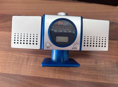 Portable FM-AM radio with blue transparent casing