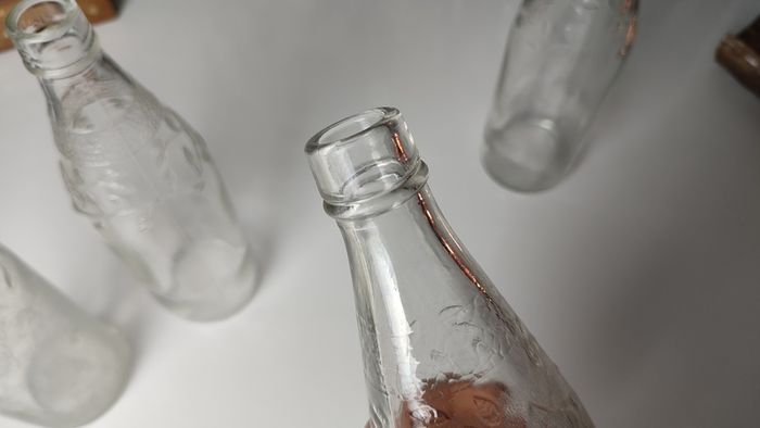 301 - Set of 4 Vintage Floral Decorative Collectible Clear Glass Tall Big Bottles