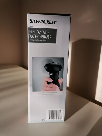 Brand New Mini Handheld Fan with Water Misting Sprayer