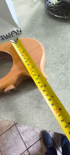 wooden piggy bank featuring a clear viewing window so you can see your savings grow.