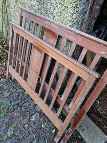Antique bed ends, teak or mahogany with inlay.