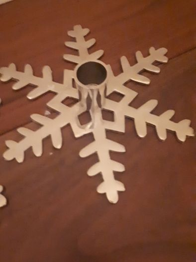 Metal snowflake candle sticks