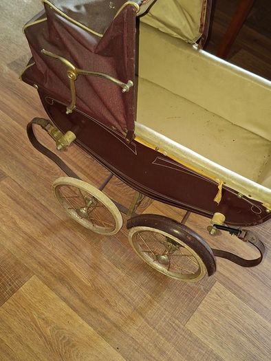 Antique Burgundy Doll's Pram, Manufactured by Walker around the 1940s, It features a Coach-Built Style Carriage with distinctive Wire-Spoke Wheels and Hard Rubber Tires Collection Only