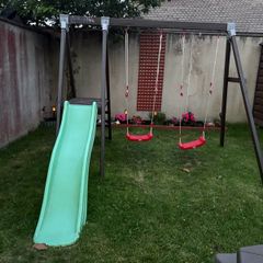 Double swing set with slide.