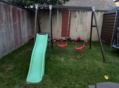 Double swing set with slide.