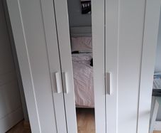 Wardrobe for sale. Dimensions: Width: 117, Depth: 50, Height: 190. All measurements in centimetres.  One mark on left side as can be seen in photo. Will require a van or large trailer and two strong people to carry it down a flight of stairs.
