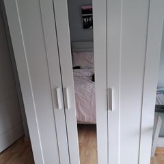 Wardrobe for sale. Dimensions: Width: 117, Depth: 50, Height: 190. All measurements in centimetres.  One mark on left side as can be seen in photo. Will require a van or large trailer and two strong people to carry it down a flight of stairs.