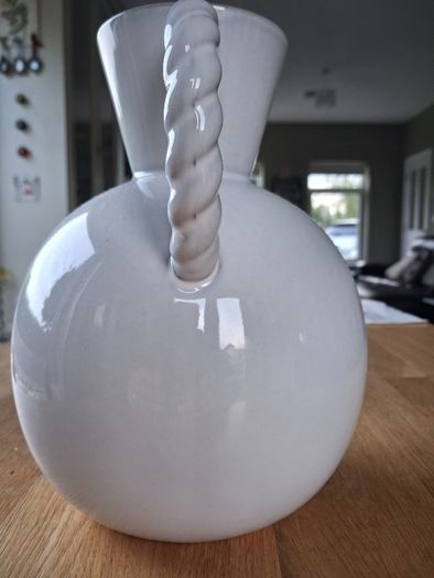 White ceramic vase with rope-style handle