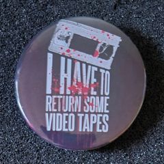 Video tapes, pin back button badge.