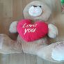 Large Teddy holding a heart Image 6