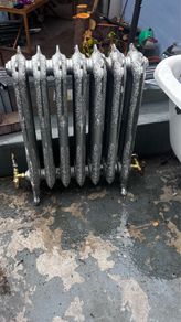Cast iron radiator in perfect condition with period brass rad valves