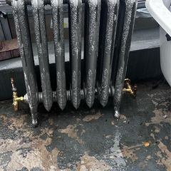 Cast iron radiator in perfect condition with period brass rad valves