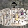 An Abra 9 Carat Gold Watch, Sapphire winder, Ruby on inner Image 7