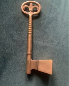 Vintage brass key shaped candle sniffer