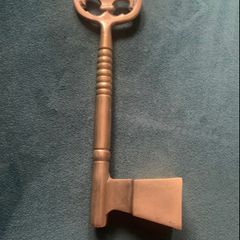 Vintage brass key shaped candle sniffer