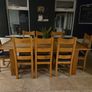 Oak extendable Kitchen Table with up to 8 leather/oak chairs Image 2