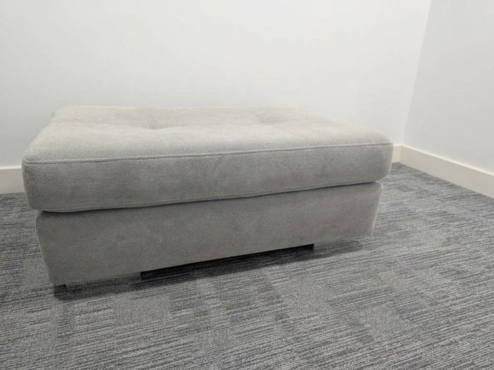 pouffe grey sitting