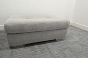 pouffe grey sitting
