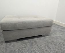 pouffe grey sitting