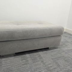 pouffe grey sitting