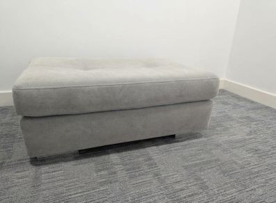 pouffe grey sitting