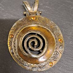 Copper pendant with orange crystals