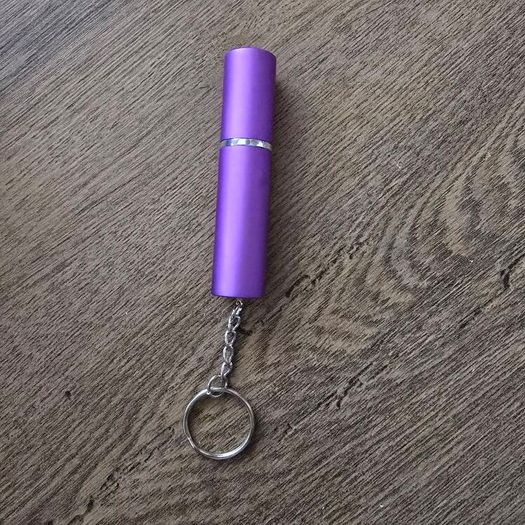 Perfume travel spray bottle keyhanger