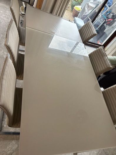 Extending dining table and chairs for sale