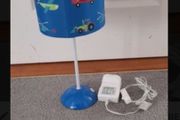 Childrens beside lamp