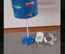 Childrens beside lamp