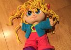 Curley Q doll