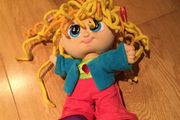 Curley Q doll