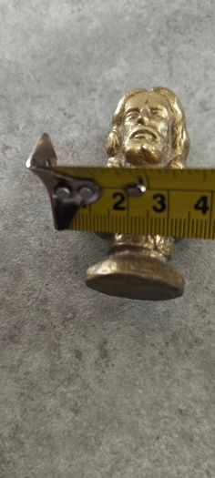 2 BRASS ITMEES-1- Primitive Antique Early Country Brass Push Up 9.5 INCHES Candlestick55.00 euro. 2- Brass Oliver Plunkett Tapper or papper wighte 60.00 euro.