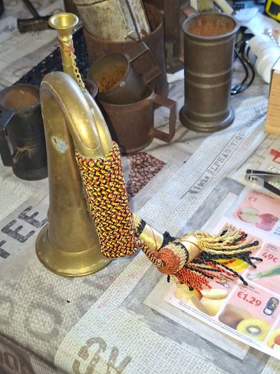 Antique Brass Military Bugle features a Distinctive Cap Badge