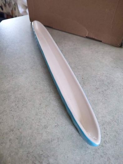Olive boat This slim, elegant olive boat 41 cm. long.