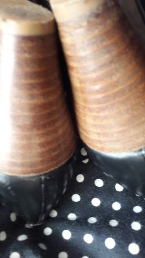 Black shoes with brown wedge heel