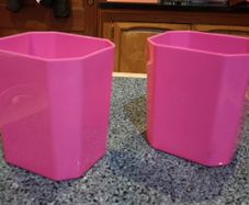 Two Plastic Pink Containers (used).