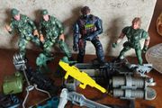 Lot of toy soldiers and weapons.