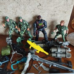 Lot of toy soldiers and weapons.