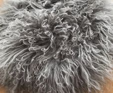 FLUFFY AND COMFORTABLE:Thick and shorn wool provides maximum comfort by increasing circulation and reduces pressure points while sitting for extended periods of time on this fur seat cushion; Soft and soothing to promote sleep while providing exceptional 
