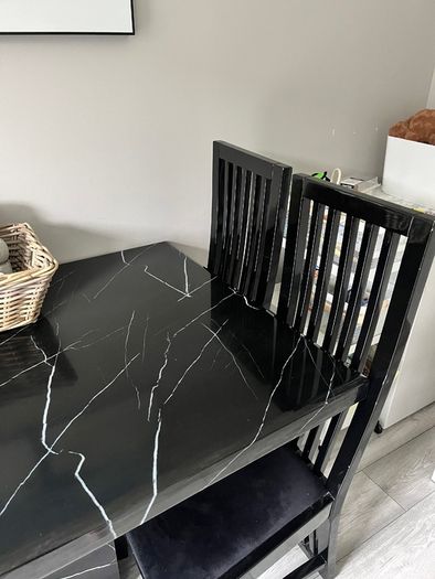 Table and chairs and glass cabinet