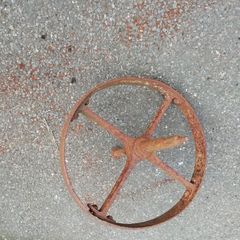 Iron wheelbarrow wheel