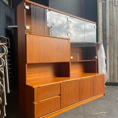 A large Mid Century teak 2 piece living room unit, by Morris of Glasgow