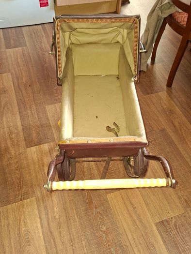 Antique Burgundy Doll's Pram, Manufactured by Walker around the 1940s, It features a Coach-Built Style Carriage with distinctive Wire-Spoke Wheels and Hard Rubber Tires Collection Only